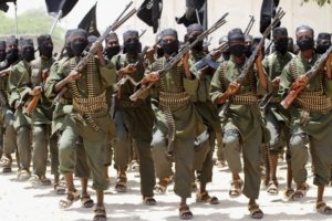 New recruits belonging to Somalia's al-Qaeda-linked al Shabaab rebel group march during a passing out parade at a military training base in Afgoye